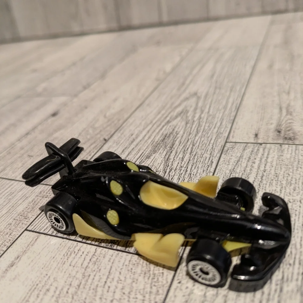 Hot Wheels Black and Yellow Formula Racer Toy Car for Kids
